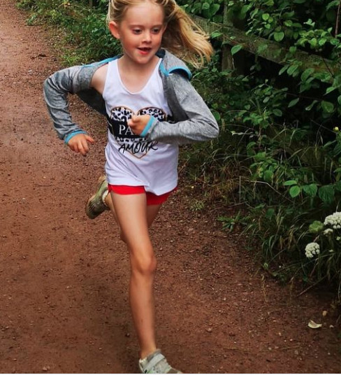 Six-year-old runs marathon to raise money for teacher's illness
