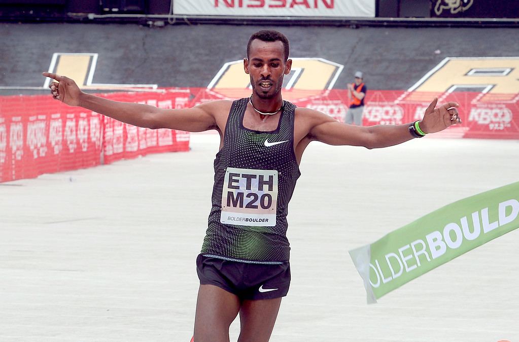 Ethiopia's Getaneh Tamire wins the men's pro race by wide margin at the 40th annual Bolder Boulder 10K