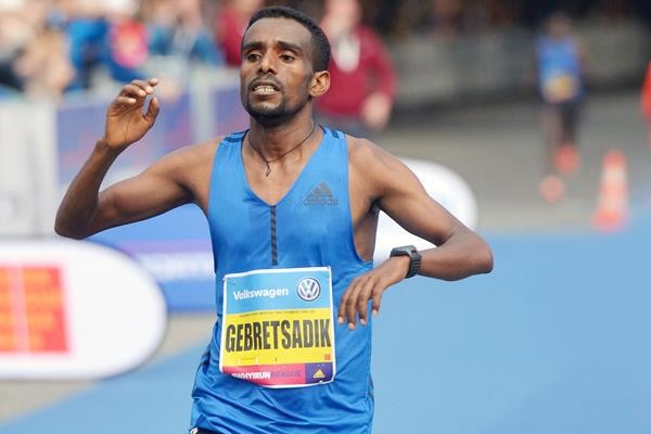 Hiwot Gebrekidan and Gebretsadik Abraha took an Ethiopian double at the Guangzhou Marathon, smashing the course records 