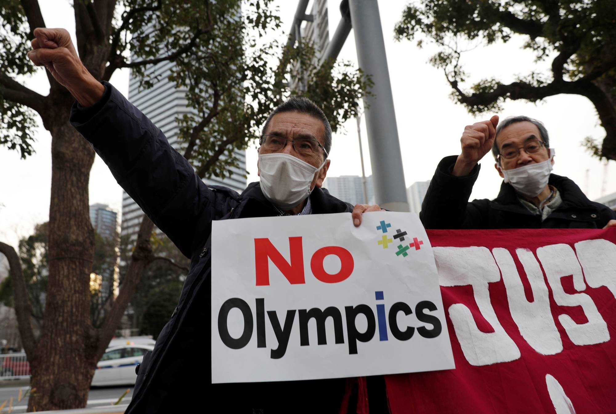 Survey shows that over half of Japan firms want Olympics cancelled or postponed