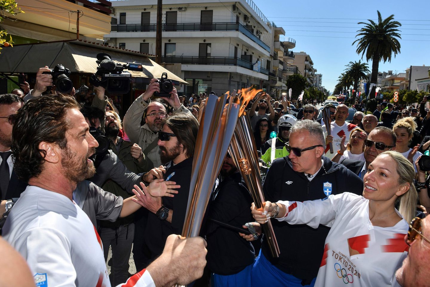 One day after flame was lit, Greece suspends Olympic torch relay because of coronavirus