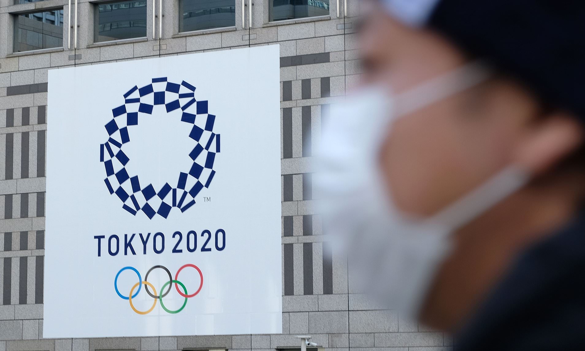 Athletes at the coronavirus-postponed Tokyo Olympics will face regular testing, restrictions on mingling and potential punishment for non-compliance with health rules