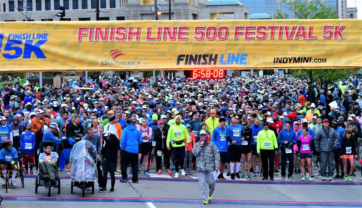 Panuel Mkungo From Kenya Won The 500 Festival Mini-marathon Clocking 1: 